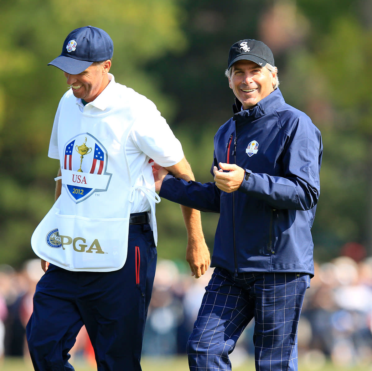 Fred Couples (right) and Jim "Bones" Mackay at the 2012 Ryder Cup.