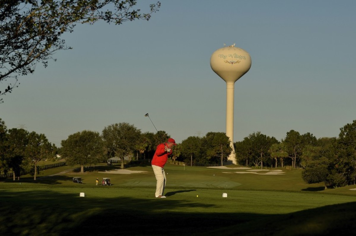 Golf defines the sprawling development at The Villages, Fla., where 12 championship courses, 41 executive courses and 2 other short courses enhance a lifestyle literally built around the game. 