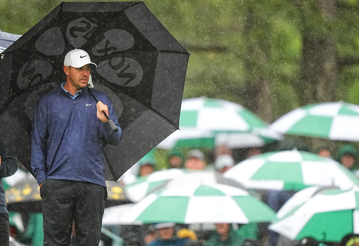 LIV golfer Brooks Koepka is in command of the Masters with a four-stroke lead in the third round after play was suspended because of inclement weather at Augusta National.