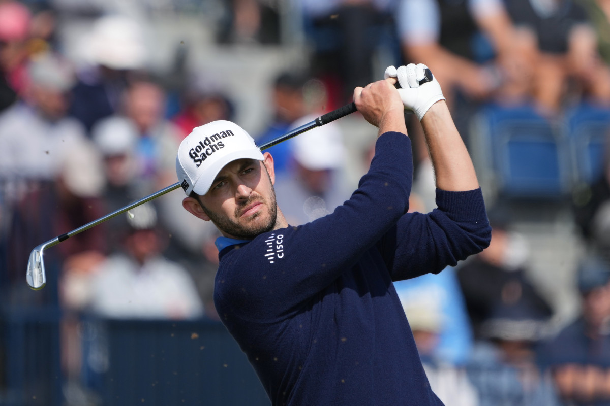 Patrick Cantlay plays his shot from the fourth tee during the first round of The Open Championship golf tournament at Royal Liverpool.