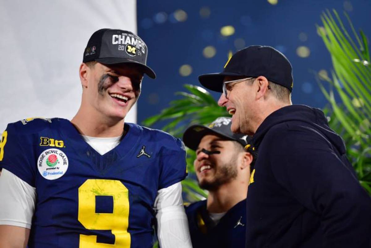 Michigan quarterback J.J. McCarthy and head coach Jim Harbaugh