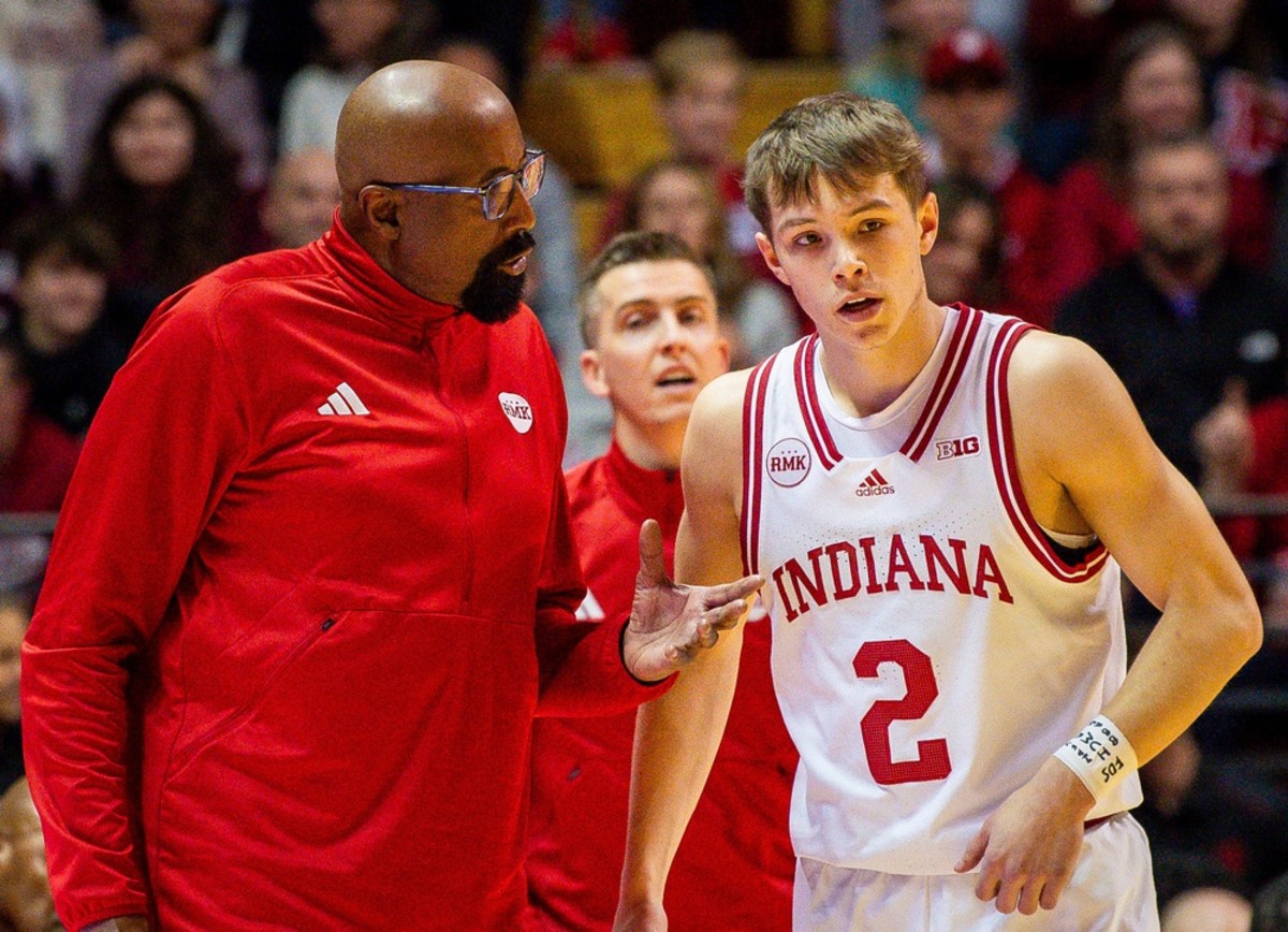 Indiana Head Coach Mike Wooson talks with Gabe Cupps (2) during the first half of the Indiana versus Ohio State men's basketball game at Simon Skjodt Assembly Hall on Saturday, Jan. 6, 2024.