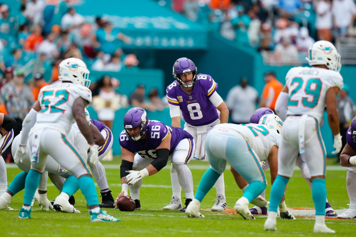 Oct 16, 2022; Miami Gardens, Florida, USA; Minnesota Vikings quarterback Kirk Cousins (8) receives the snap against the Miami Dolphins during the second half at Hard Rock Stadium.