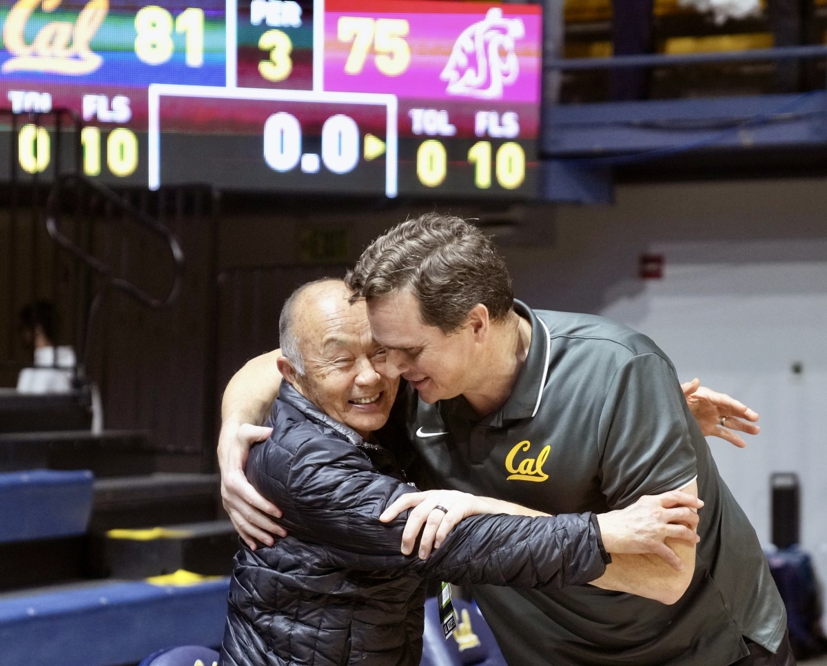 Mark Madsen celebrates with a Cal fan