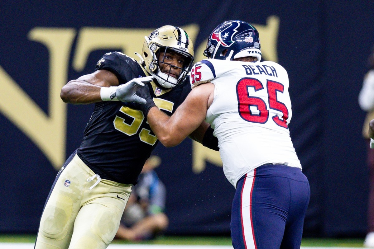 New Orleans Saints defensive end Isaiah Foskey (55) rushes against Houston Texans guard Tyler Beach (65). Mandatory Credit: Stephen Lew-USA TODAY