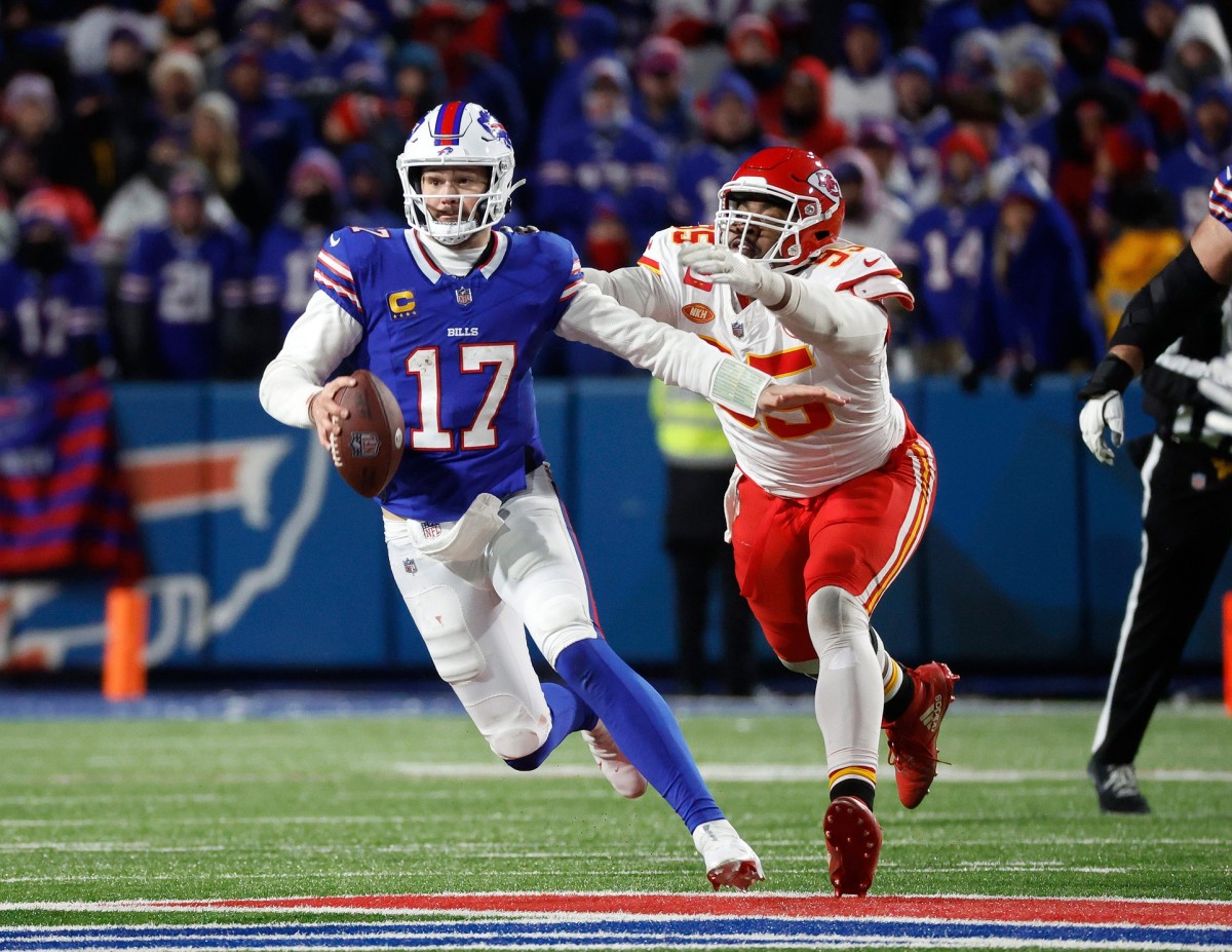 Chiefs defensive lineman Chris Jones runs down Bills quarterback Josh Allen during their AFC divisional game Sunday.