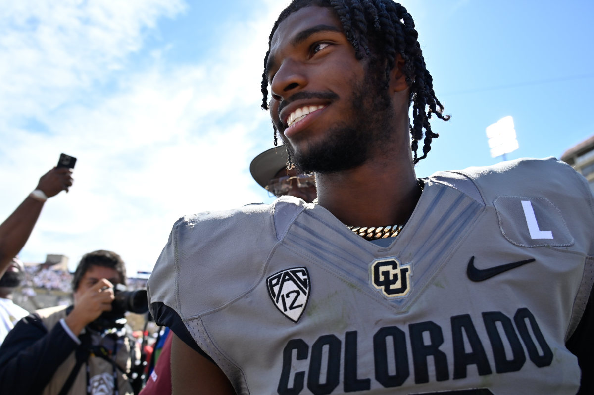 Sep 30, 2023; Boulder, Colorado, USA; Colorado Buffaloes quarterback Shedeur Sanders (2) smiles as he walks off the field after the game against the USC Trojans at Folsom Field