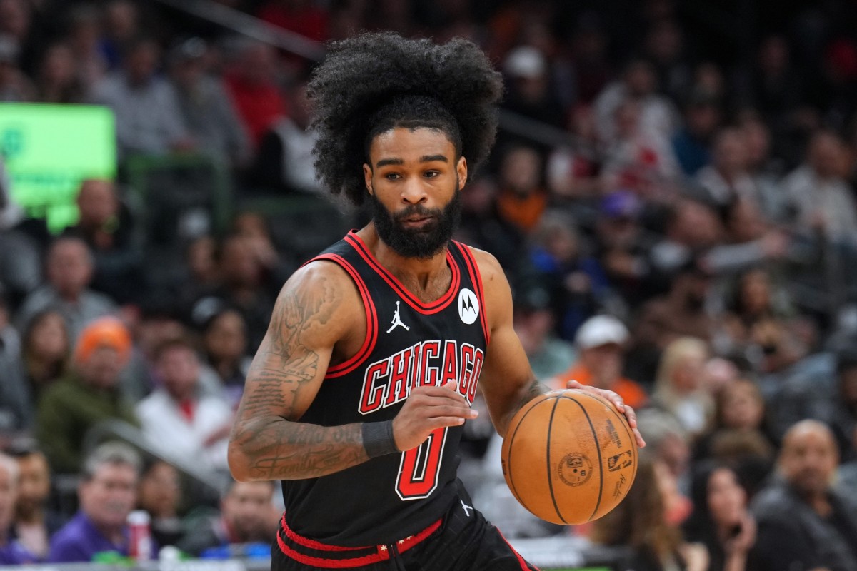 Chicago Bulls guard Coby White (0) dribbles against the Phoenix Suns during the first half at Footprint Center. 