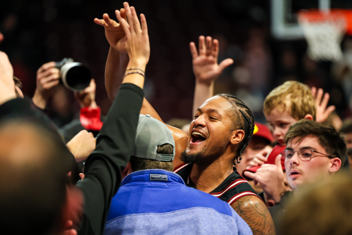 Ta'Lon Cooper celebrating amongst the student body after the Gamecocks upset win over No. 6 Kentucky (23rd Jan., 2024)