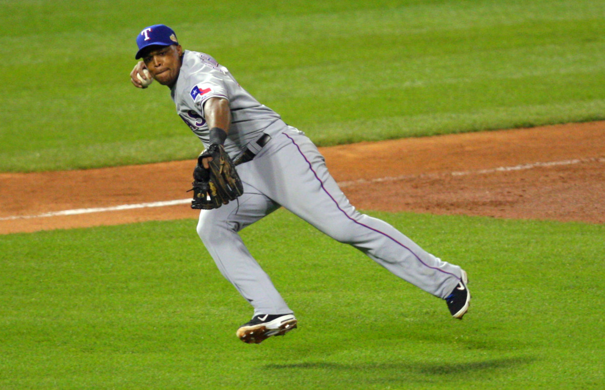 Former Texas Rangers third baseman Adrian Beltre, seen here fieling a ball against the St. Louis Cardinals in Game 6 of the 2011 World Series at Busch Stadium.