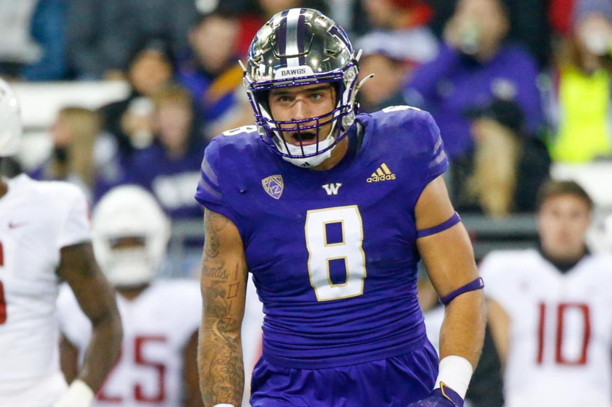 Washington Huskies defensive lineman Bralen Trice (8)