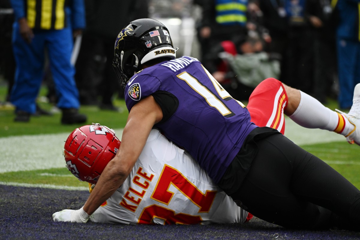 Chiefs tight end Travis Kelce makes a great catch for a touchdown with Baltimore's Kyle Hamilton draped all over him during the AFC championship.