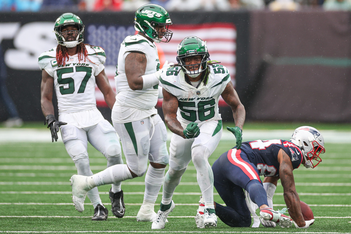 Sep 24, 2023; East Rutherford, New Jersey, USA; New York Jets defensive end Carl Lawson (58) celebrates after a tackle against New England Patriots wide receiver Kendrick Bourne (84) during the second half at MetLife Stadium.