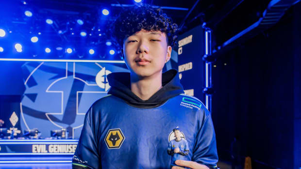 EG jojopyun holding his action figure