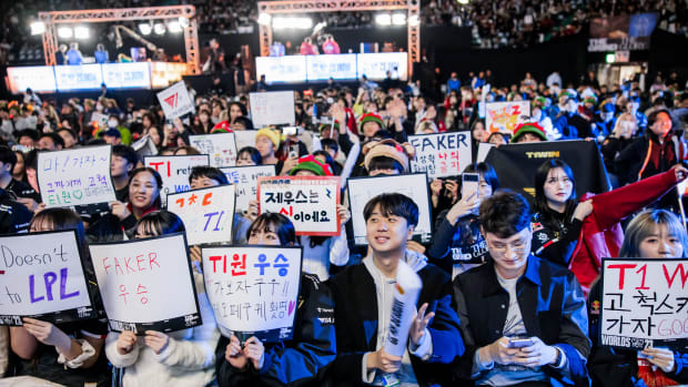 Fans support T1 in match vs JDG at Worlds 2023