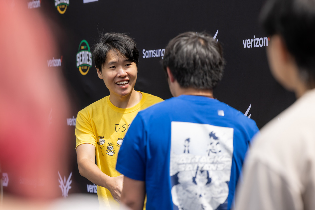 Disguised Toast shakes hands at NACL Championship meet and greet