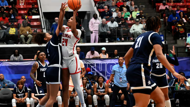 Colonial guard Jasmynne Gibson drives to the basket against Dr. Phillips during the FHSAA Class 7A girls basketball state championship game at The RP Funding Center Lakeland.