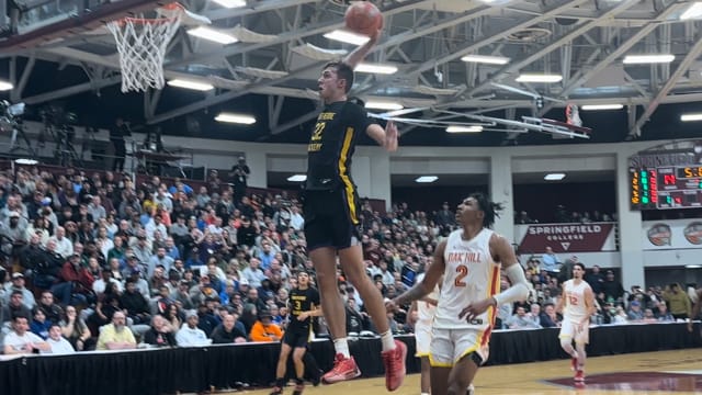 Montverde's Cooper Flagg skies for a dunk during a game against Oak Hill Academy at the Hoophall Classic in Springfield, Massachusetts.