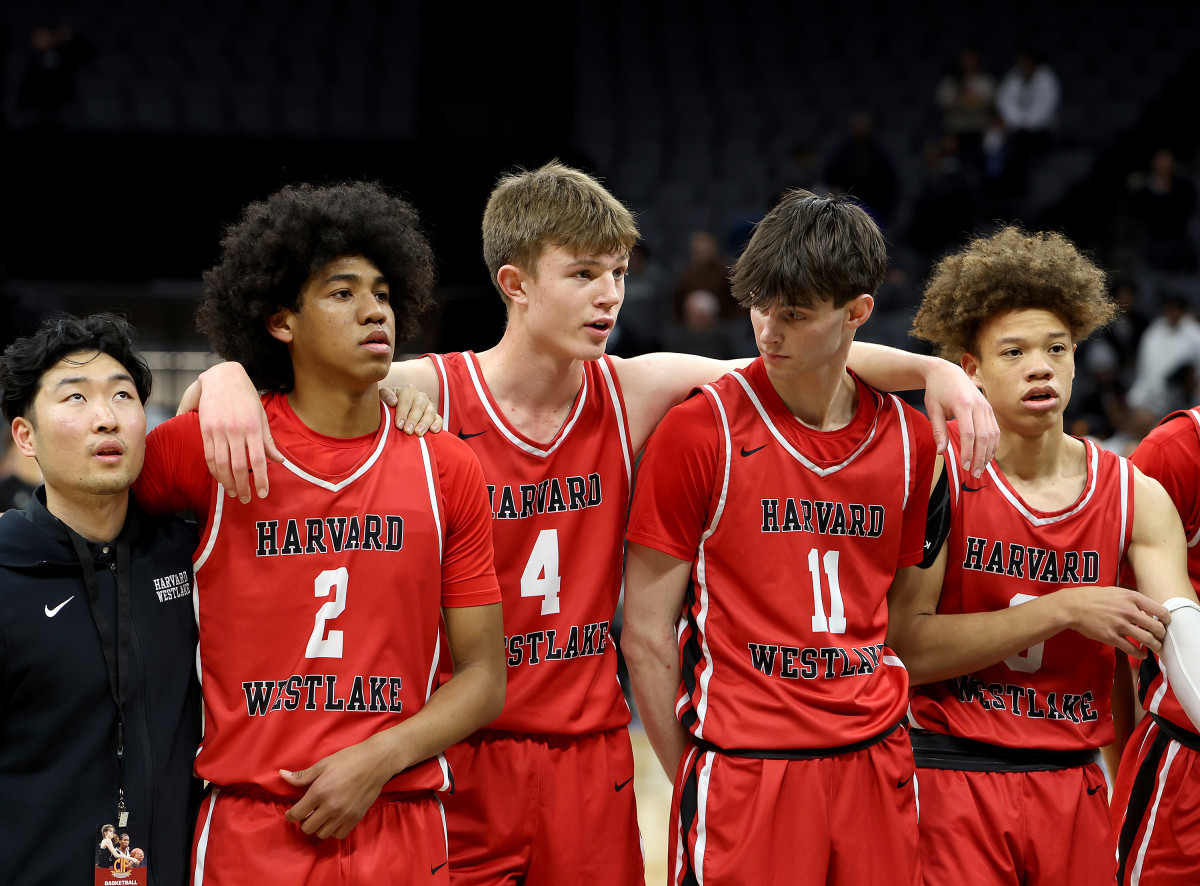 Brady Dunlap (11) poses after winning a state title with teammates Robert Hinton (2), Nikolas Khamenia (4) and Trent Perry (0). Photo: Dennis Lee.