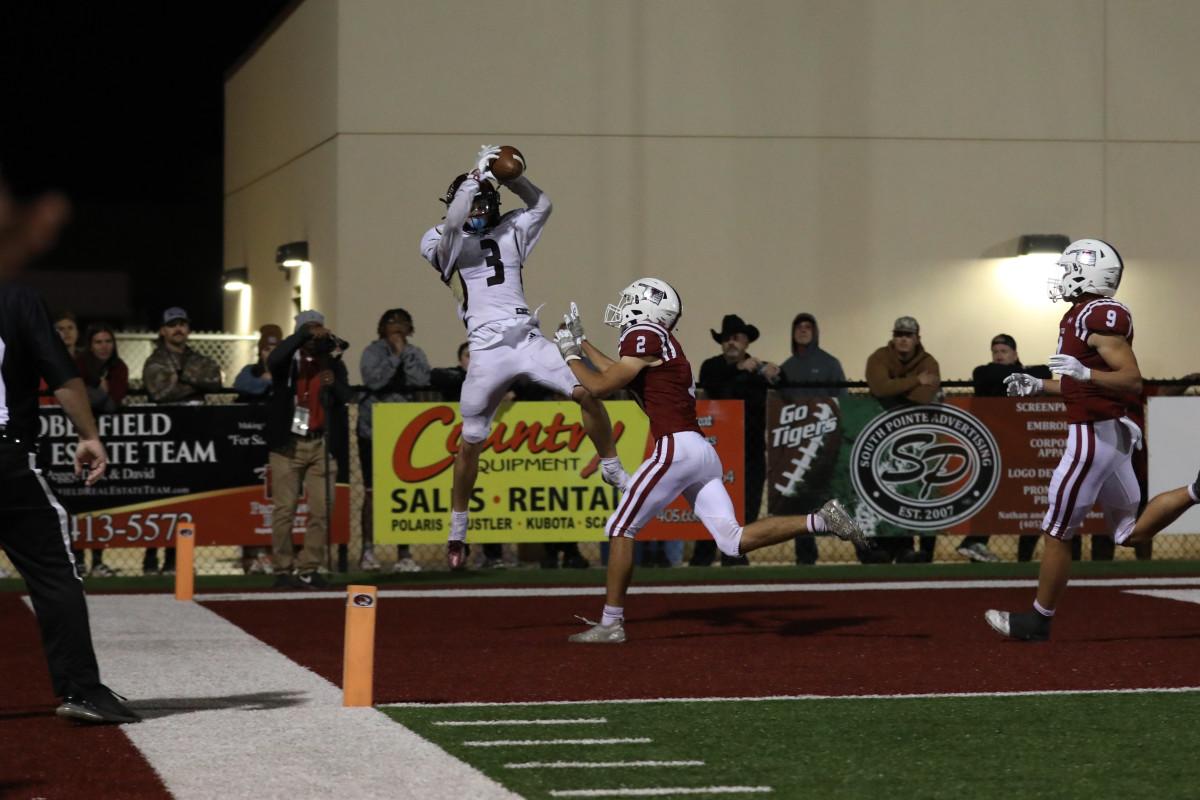 Blanchard receiver Jaxon Laminack goes up to make the game-winning catch in the Lions' 30-28 win at Tuttle on Oct. 7, 2022. Photo courtesy of Rachelle Rogers/RSP Photography