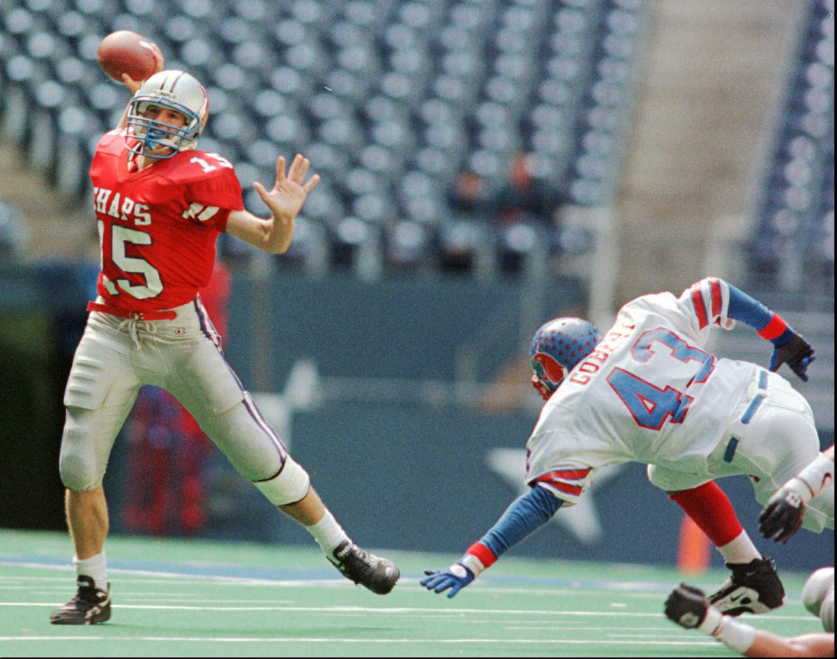 Drew Brees escapes the shoe tackle of Abilene Cooper's Eric Gobert in a lopsided Texas high school football showdown in 1996.