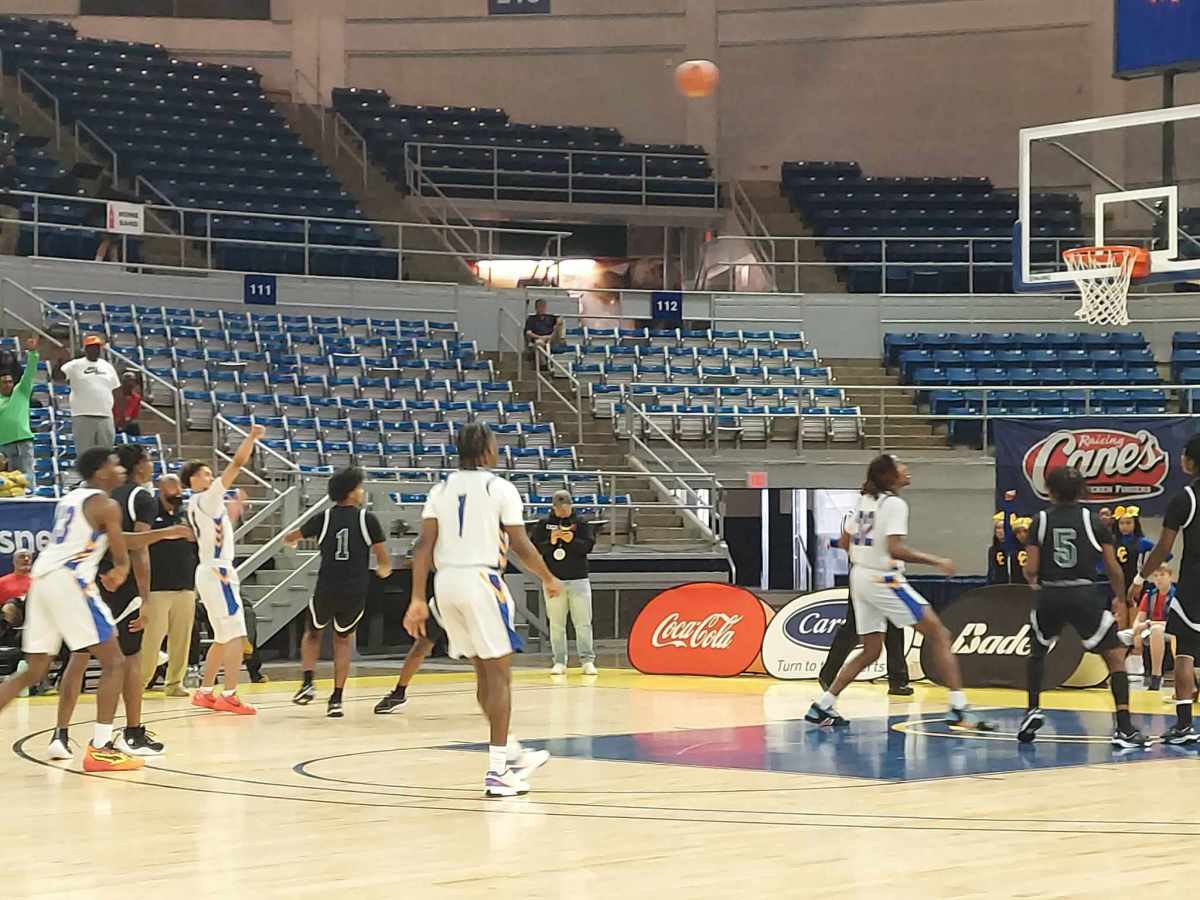 Crescent City Christian (in white) avenged last season's playoff loss to Lincoln Prep with a 62-55 win in the Division IV select semifinals March 6, 2024.