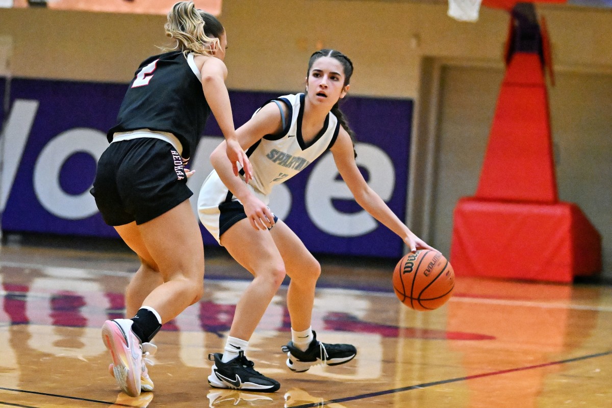 a Corvallis South Albany 5A Oregon girls basketball quarterfinal 2024 Leon Neuschwander 11