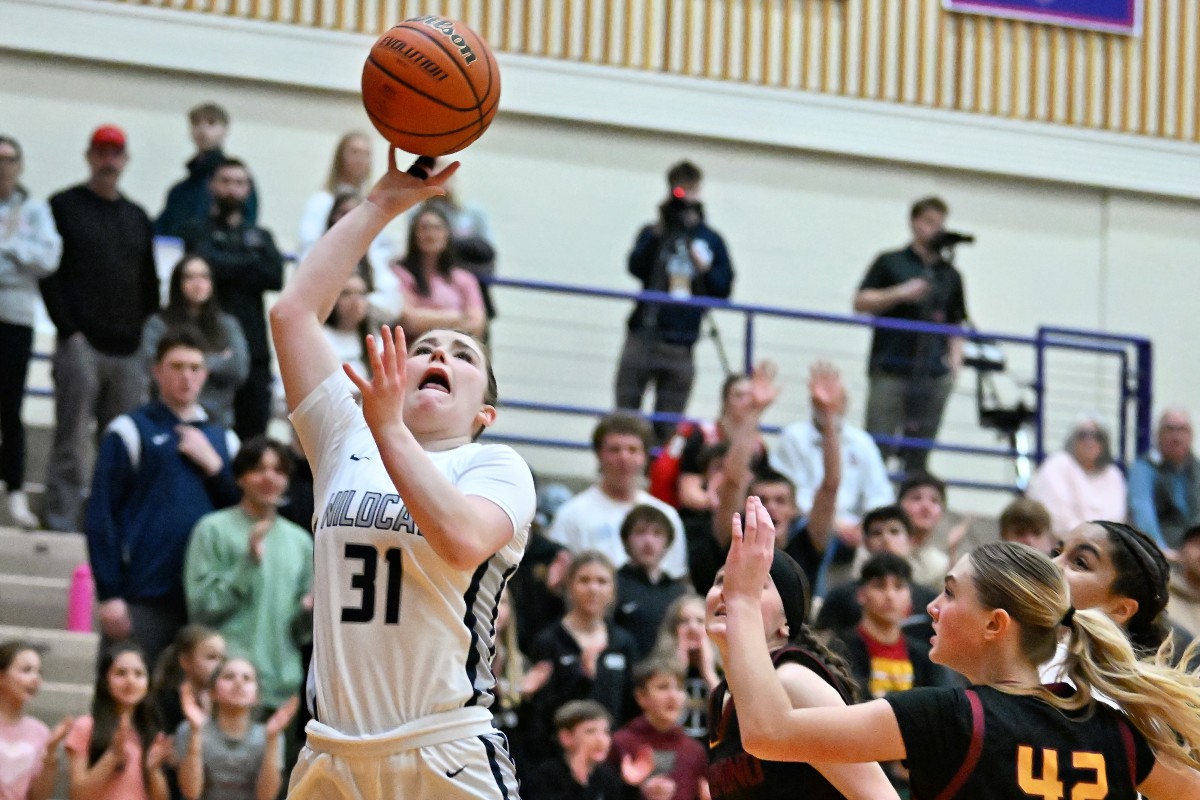 a Redmond Wilsonville 5A Oregon girls basketball quarterfinal 2024 Leon Neuschwander 2