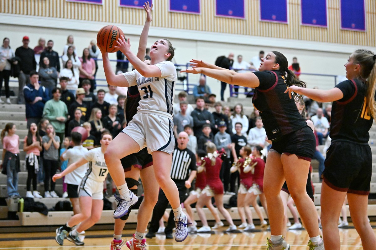 a Redmond Wilsonville 5A Oregon girls basketball quarterfinal 2024 Leon Neuschwander 5