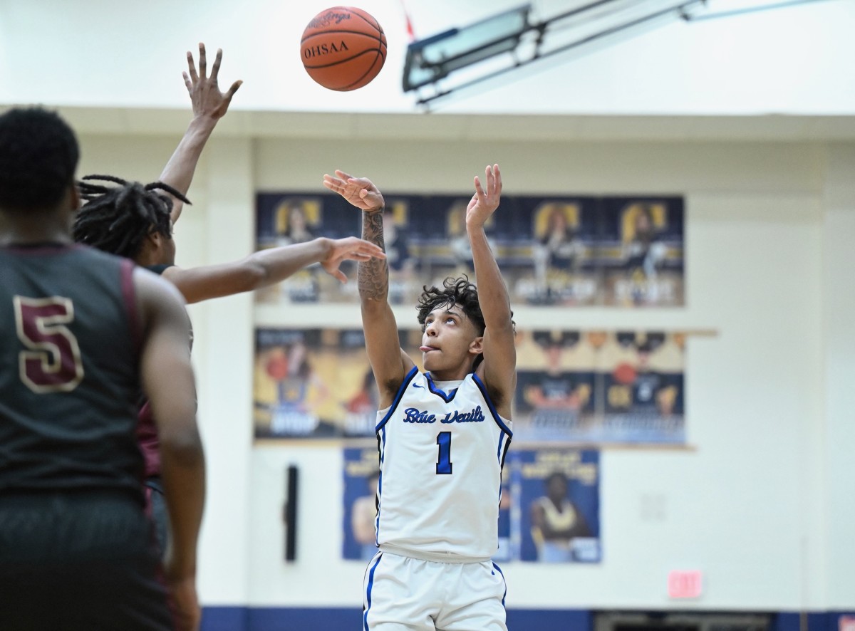 Quinn Barnett of Brunswick takes a jump shot against Akron Garfield during a district semifinal on March 6, 2024.