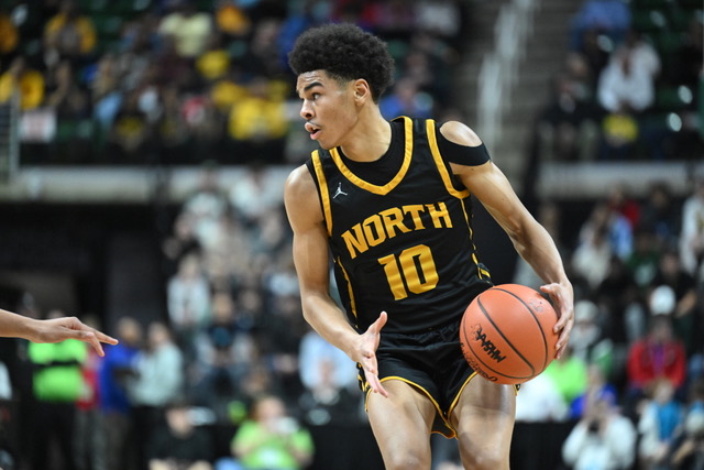 Landon Williams handles the ball in the 2024 MHSAA Division 1 title game against Orchard Lake St. Mary's. Photo by Scott Hasse