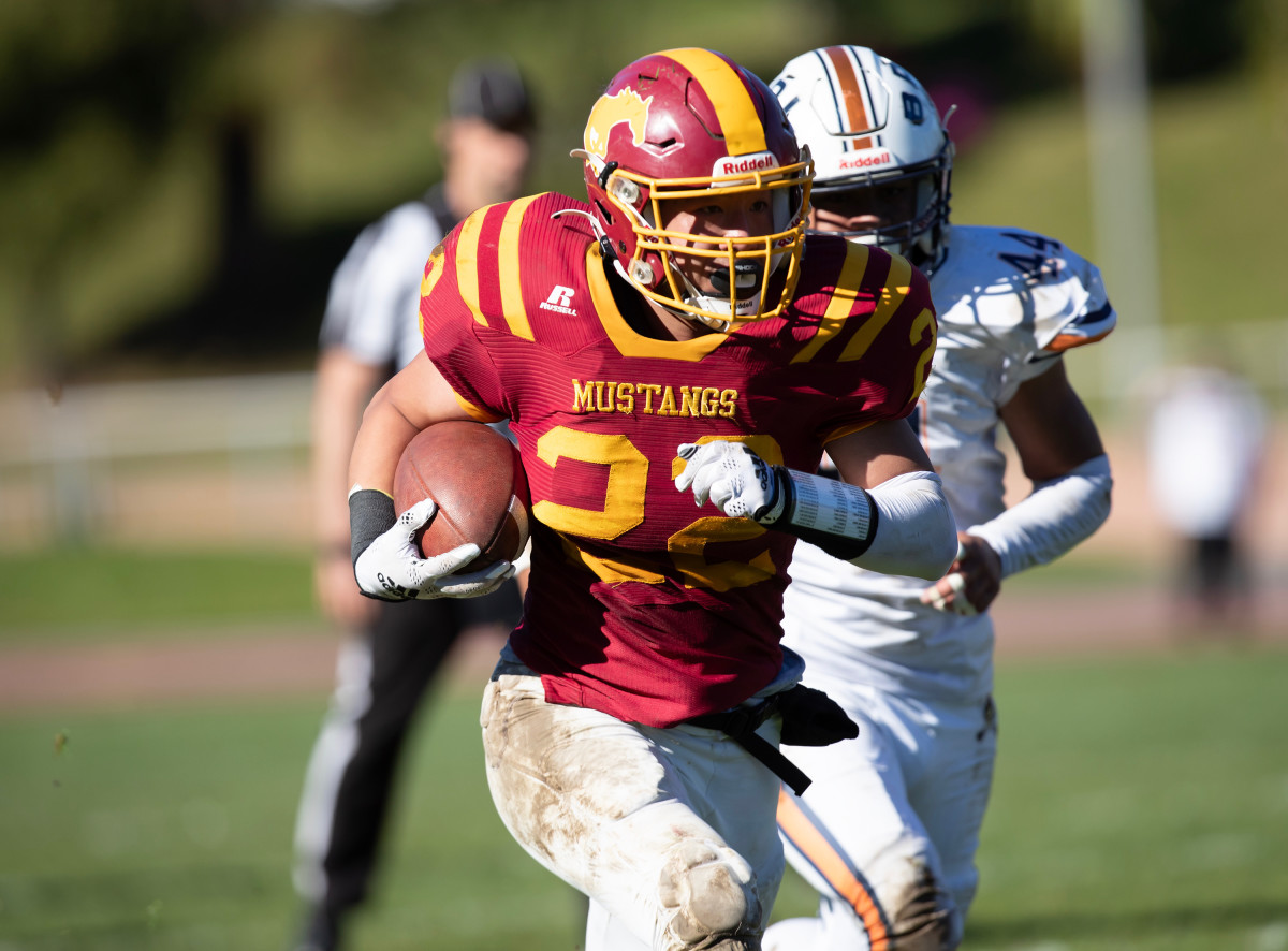 Kevin Zhao with the first of his two touchdowns, a 65-yard catch and run to give Lincoln a 14-0 lead. 