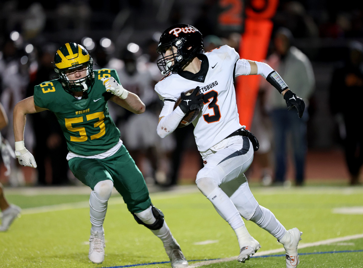 Pittsburg's Noah Quesada running away from Kaleb Pleis