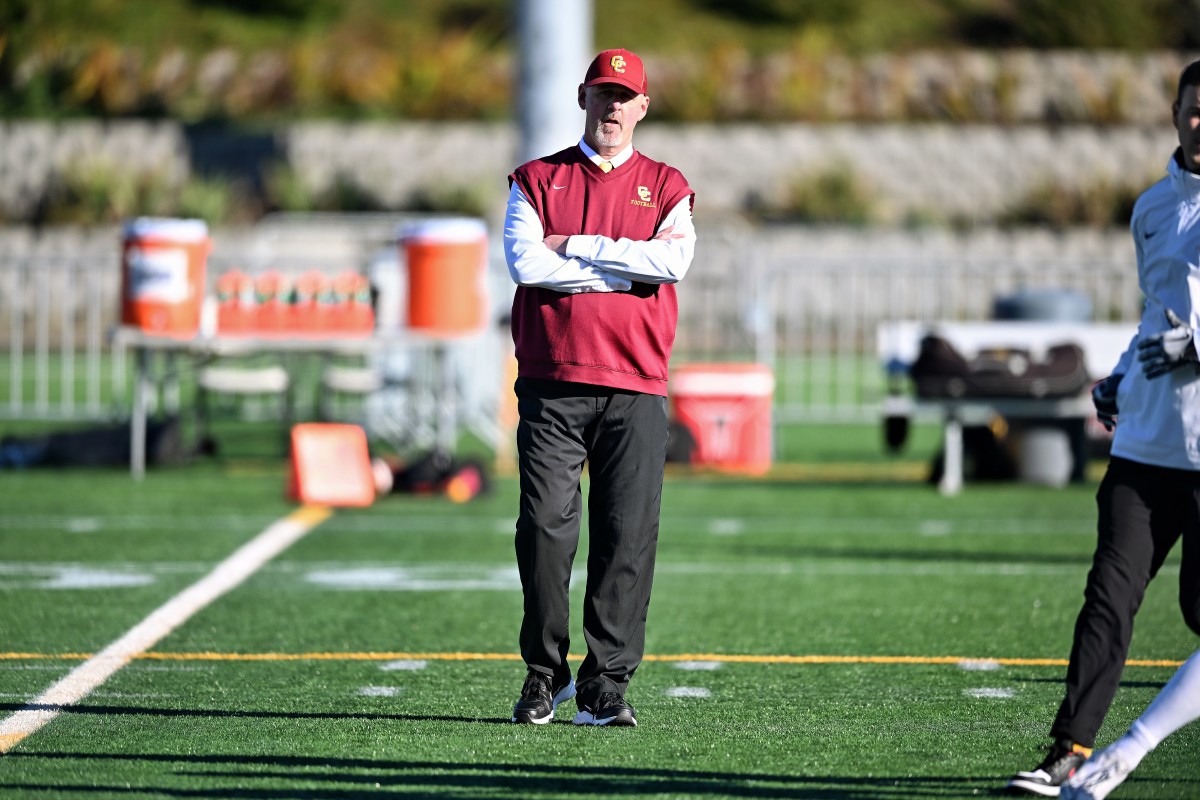 Steve Pyne cases the field at Hillsboro Stadium before leading Central Catholic to a 2023 OSAA 6A state championship win over Tualatin in November, his fifth state title. (Photo by Leon Neuschwander) 