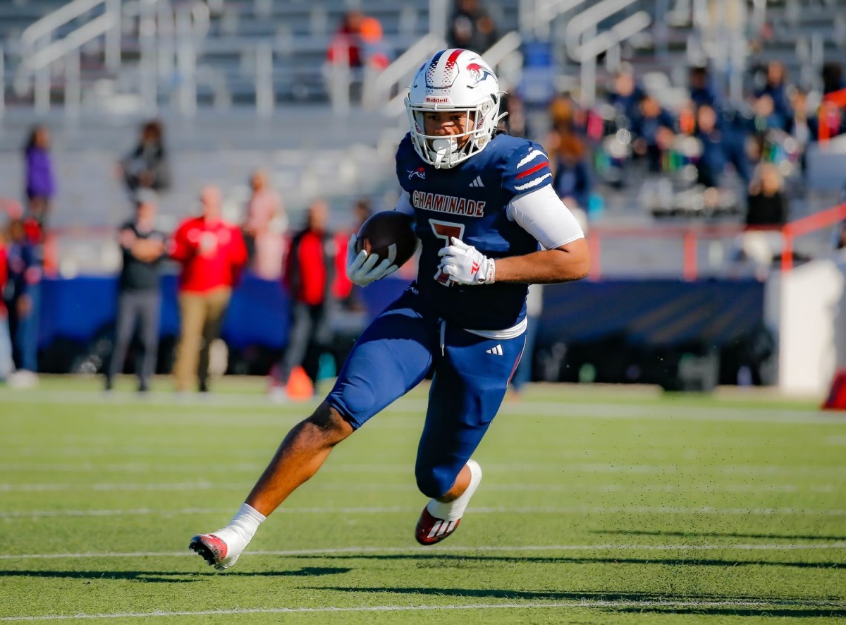 Chaminade-Madonna running back Davion Gause gets outside in the Lions victory over Clearwater Central Catholic in the FHSAA 1A football state championship game. 12/7/2023