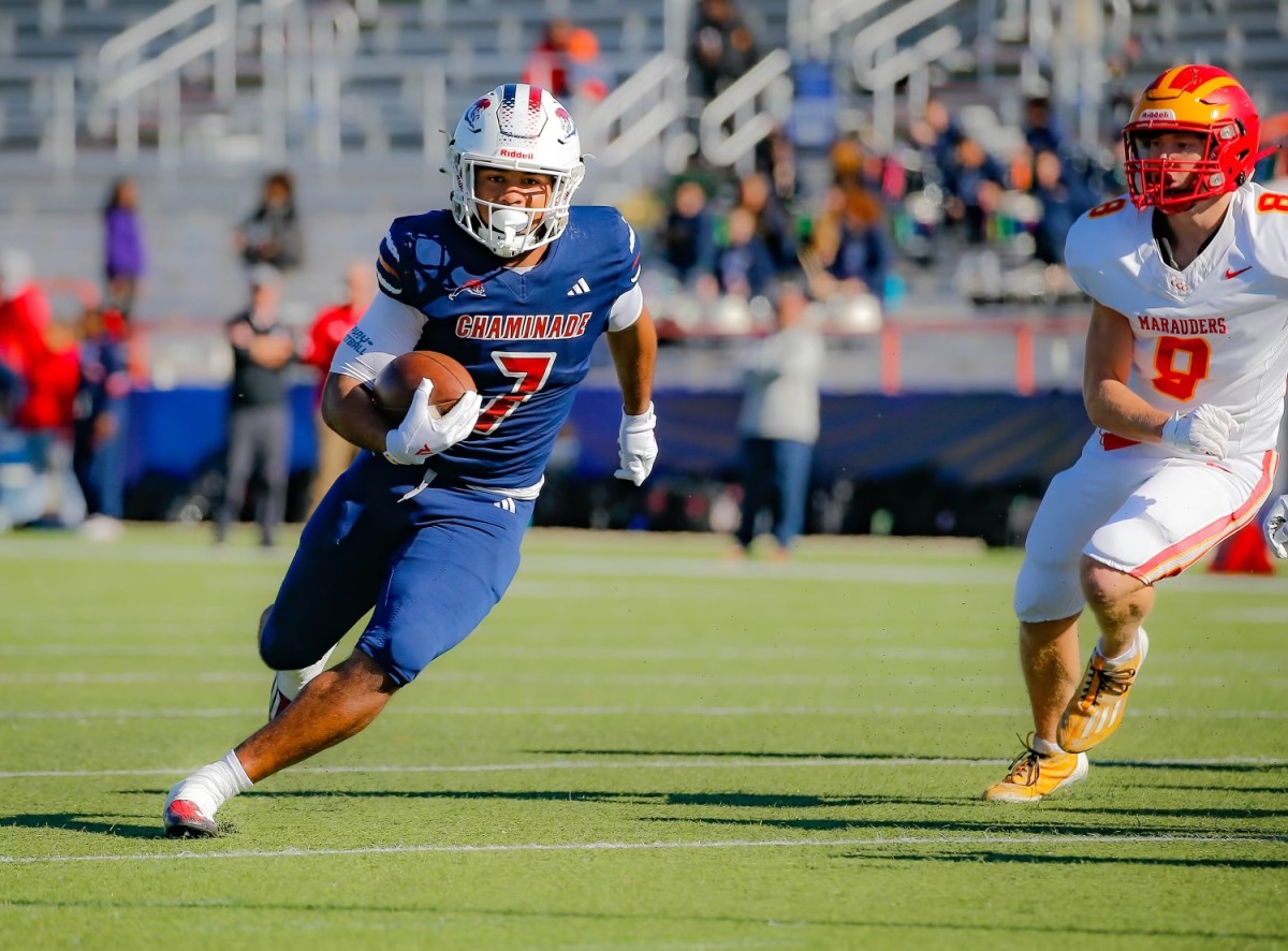 Chaminade-Madonna running back Davion Gause gets outside of Gedontae Rich (9) in the Lions victory over Clearwater Central Catholic in the FHSAA 1A football state championship game. 12/7/2023