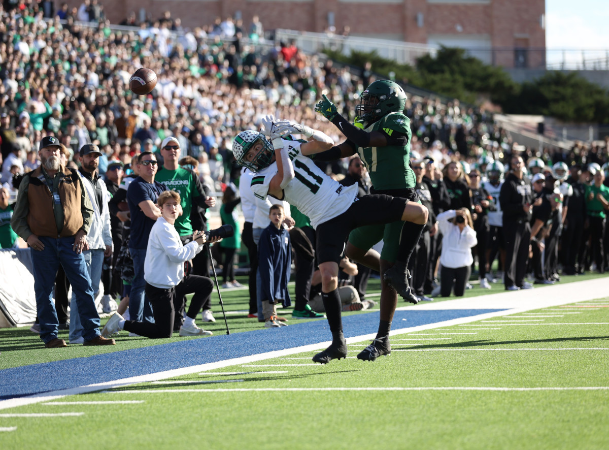 DeSoto junior safety Sael Reyes successfully contests a deep ball in one-on-one coverage in the first half of the 6A Division II playoffs on Saturday at Allen ISD Stadium.