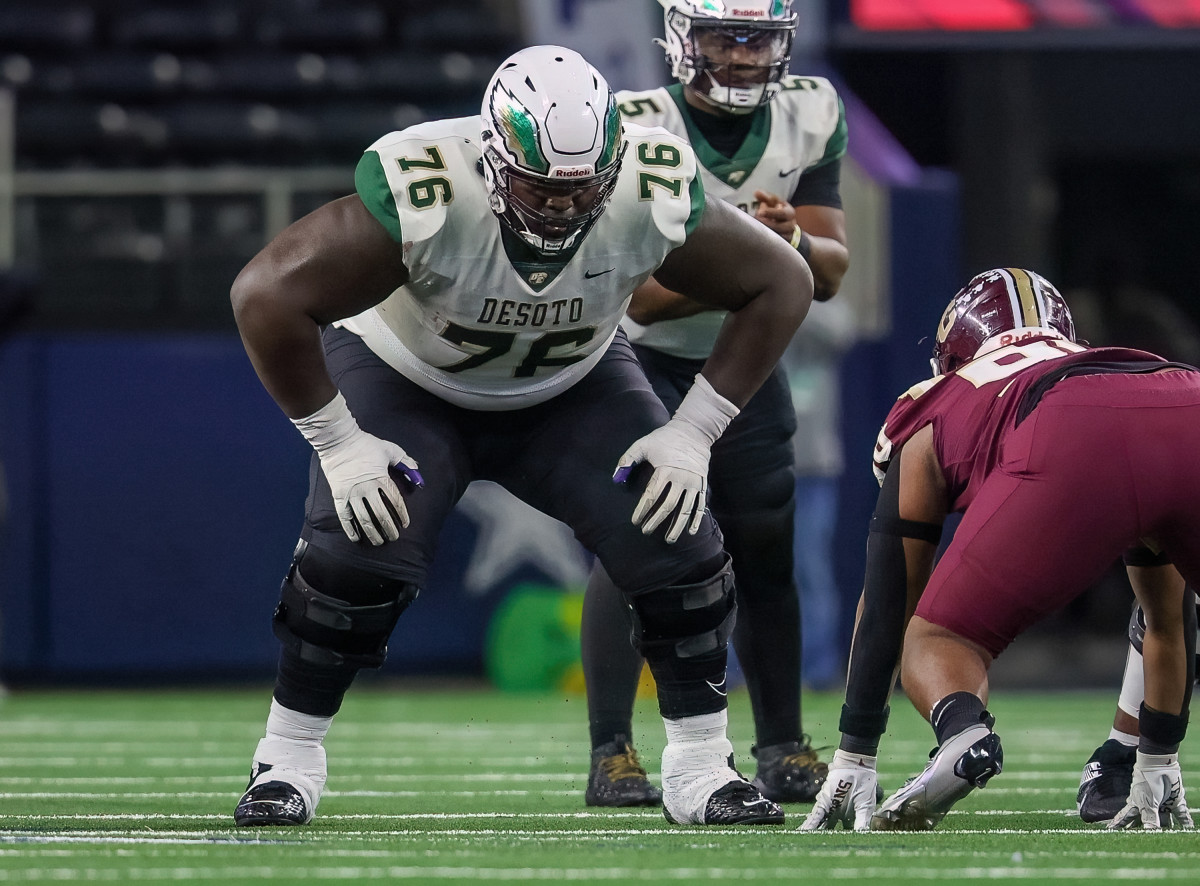 DeSoto quarterback Darius Bailey (5) had to feel more comfortable in the pocket knowing Byron Washington (76) was blocking for him in the state championship game Saturday.