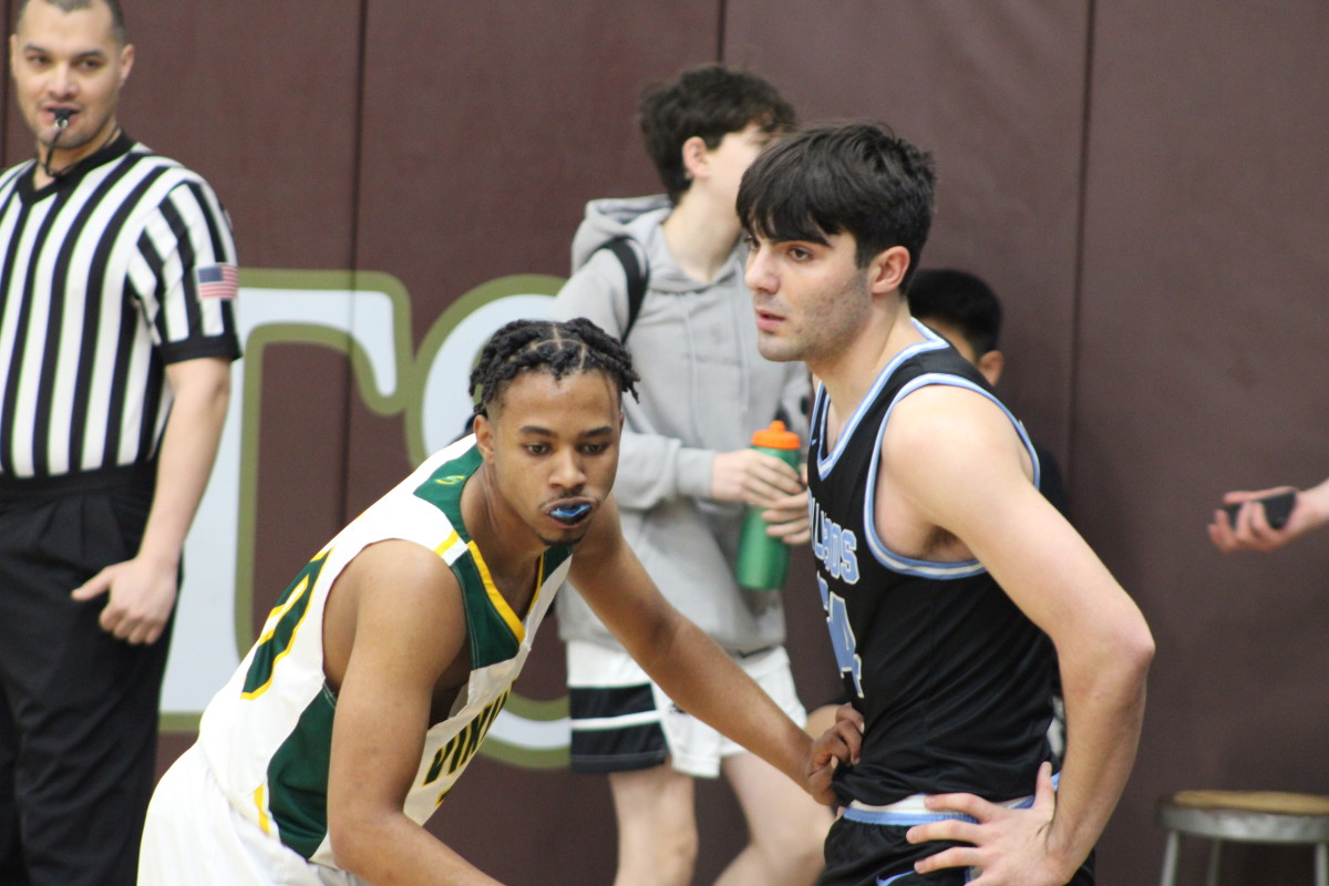 Anto Balian (right) being face guarded by Blair defender.