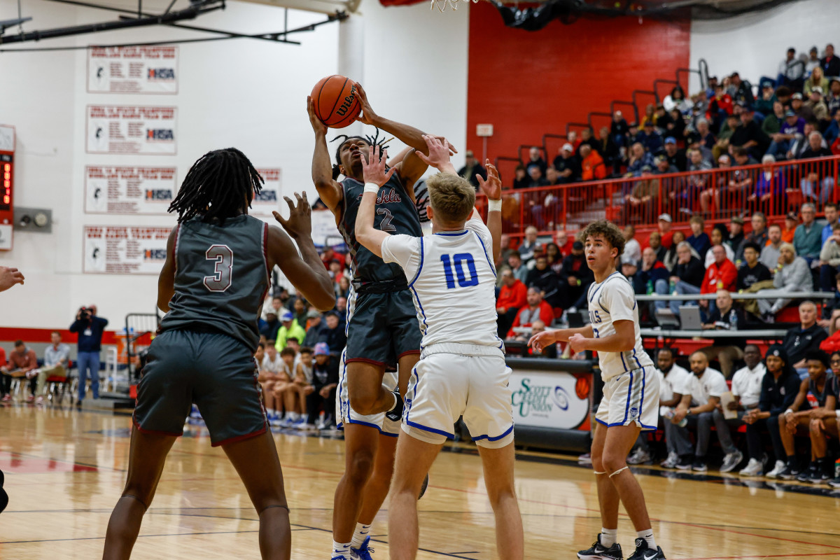 Quincy Illinois Cardinal Ritter Missouri boys basketball January 6 2024 Nate Latsch 25185