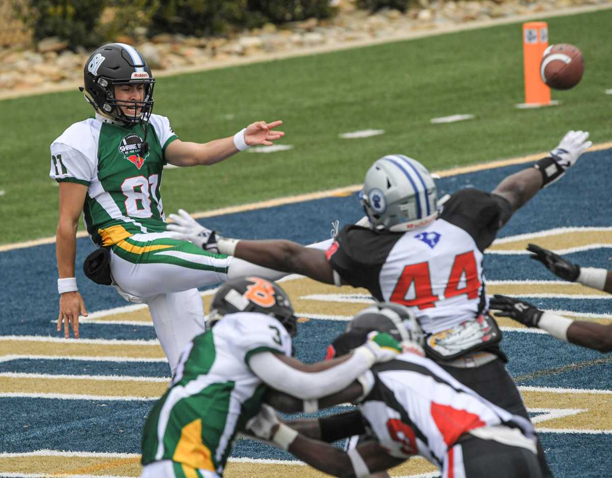 North Carolina kicker Nolan Hauser of Hough High, NC offensive MVP, punts during the third quarter of the Shrine Bowl of the Carolinas football game at Viking Stadium in Spartanburg, S.C. Saturday, December 16, 2023.