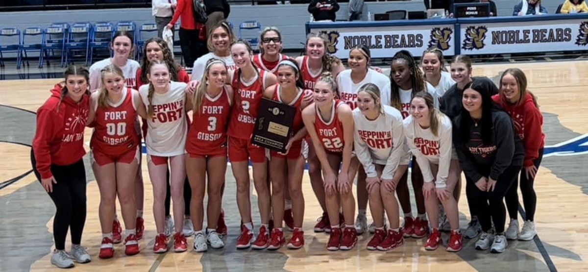 Members of the 2022-23 Fort Gibson Lady Tigers basketball team after earning the right to advance to the state tournament for the 19th consecutive season.