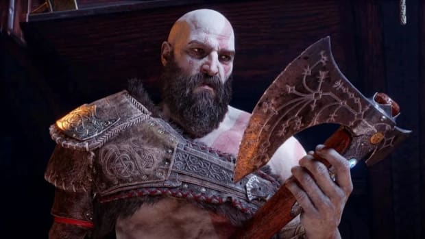 Kratos stares at the Leviathan Axe in God of War Ragnarok.