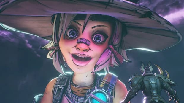 Tiny Tina from Borderlands, staring into the camera with a look of manic glee on her face