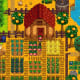 The player builds a large farm in Stardew Valley.