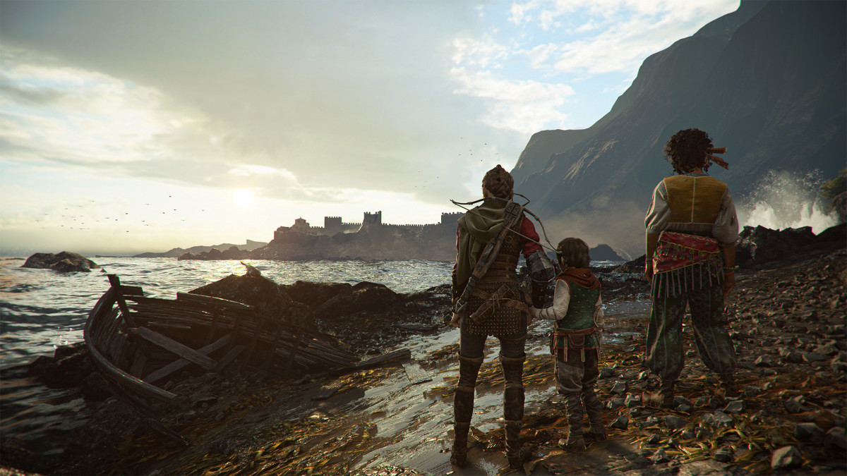 Three young persons looking at a castle.