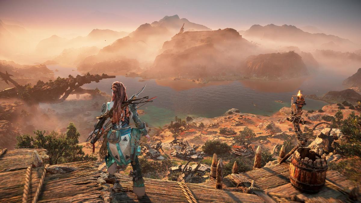 Horizon Forbidden West Aloy looks at a beautiful landscape.