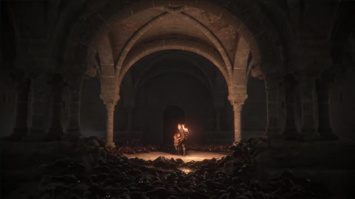 A Plague Tale: Innocence screenshot showing two people holding a torch in a dark cellar, surrounded by rats.